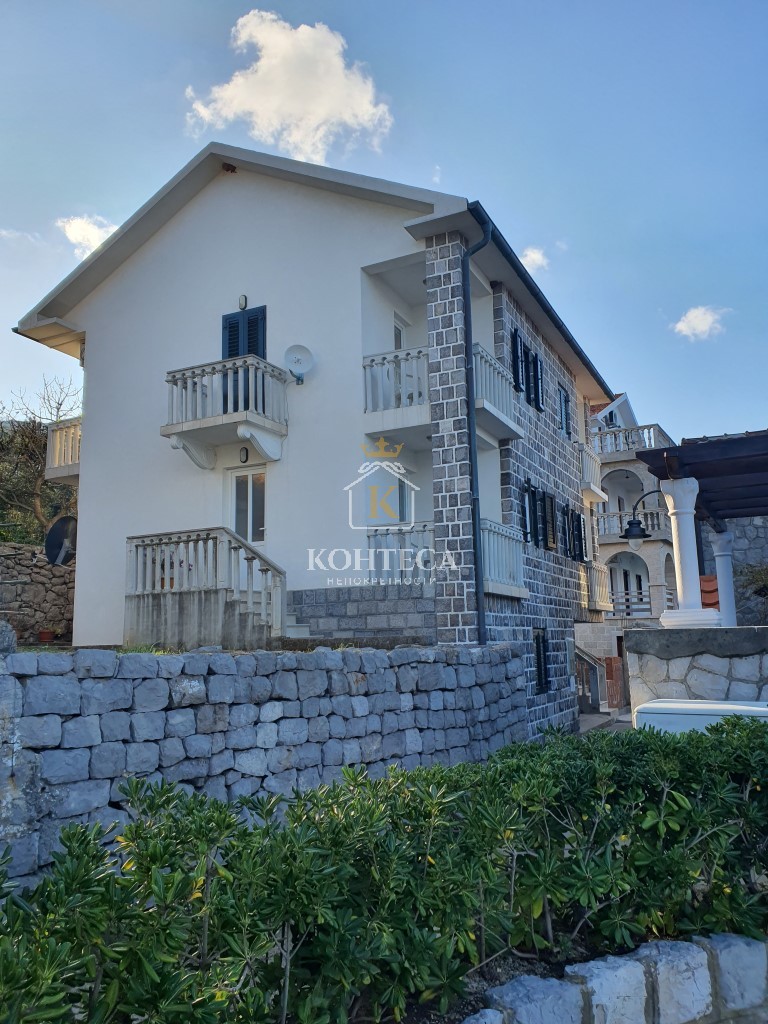 House in Krasici with apartments-5 meters from the sea